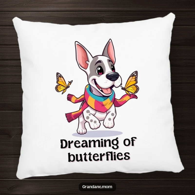 Funny Grand Dane pillow featuring a cheerful dog in a scarf playfully chasing a butterfly, soft and decorative accent.