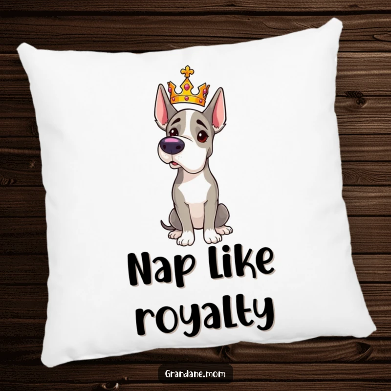 Funny Grand Dane pillow with a majestic dog wearing a tiny crown and striking a regal pose, decorative and soft.