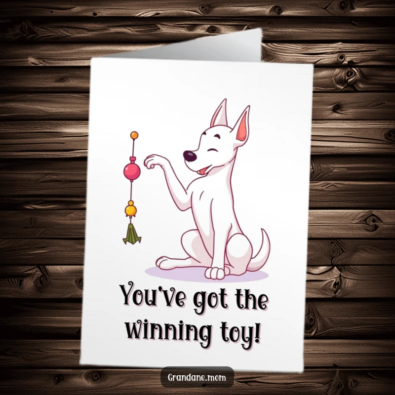 Funny Free Printable Congratulations Card: A poised Grand Dane gracefully reaches for a dangling toy in celebration.