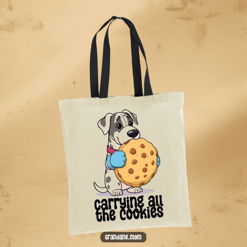 Funny Grand Dane tote bag, wearing oven mitts, presenting a huge cookie, showcasing a delightful and comical scene. Excellent funny gift accessory.