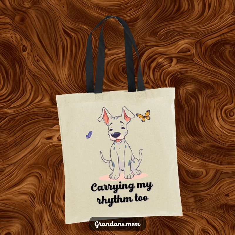Funny Grand Dane tote bag, a happy dog wiggling its body, attempting a dance with a floating butterfly.