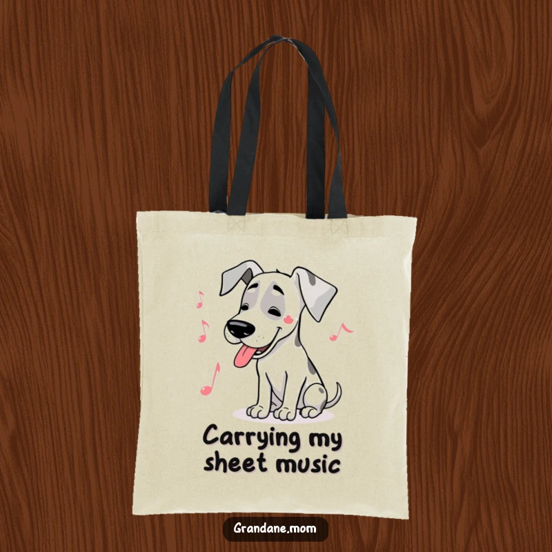 Funny Great Dane musical tote bag with a large dog humming a tune, accompanied by a musical note symbol.