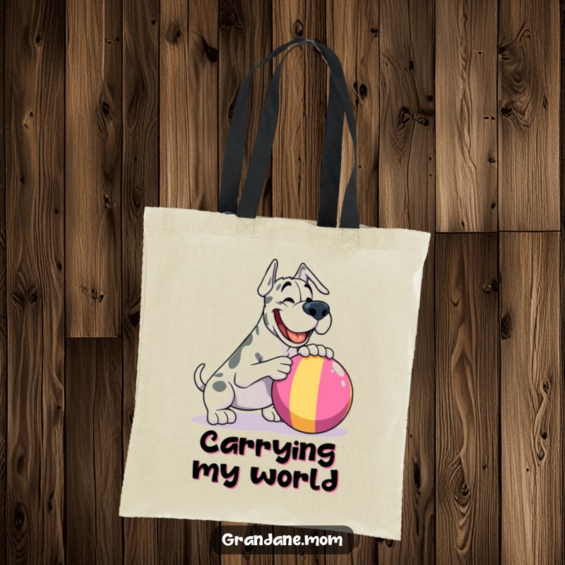 Funny Grand Dane tote bag, playfully about to nudge a brightly colored ball, perfect for carrying groceries and smiles.