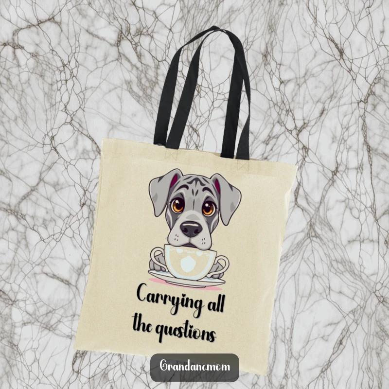 Funny Grand Dane tote bag, showing a dog with large, wondering eyes peering over the edge of a teacup.