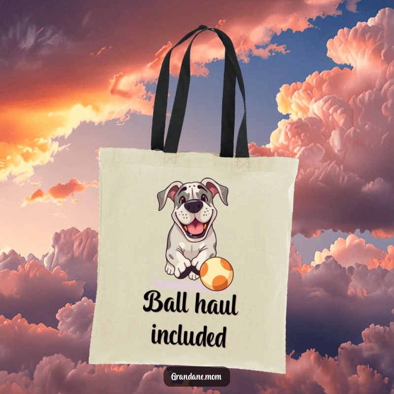 Funny Grand Dane Tote Bag: A Grand Dane with a playful grin chases a bouncing ball, carrying your items with energetic canine fun.